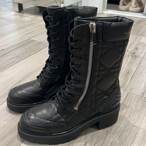 Black boots with star on bottom
